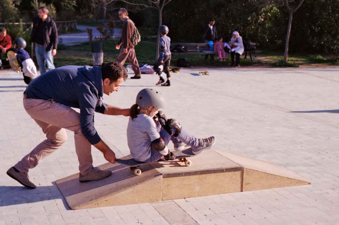 girl learning to skateboard