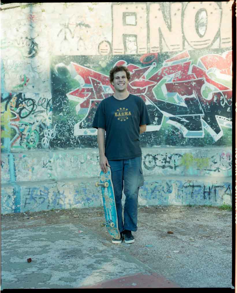 skateboarder with graffiti